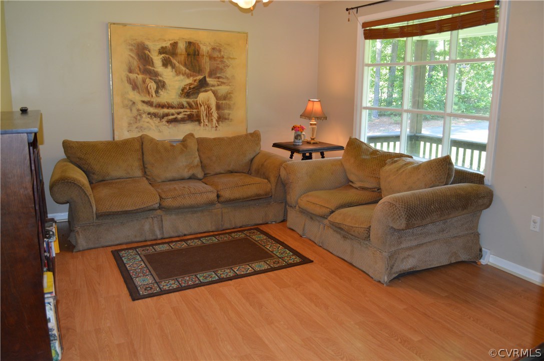 7308 Trinity Church Road Church Road, VA 23833 - Photo 4 of 37 a living room with furniture and a large window