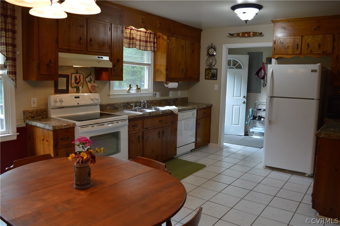 7308 Trinity Church Road Church Road, VA 23833 - Photo 6 of 37 a kitchen with a sink stainless steel appliances and cabinets