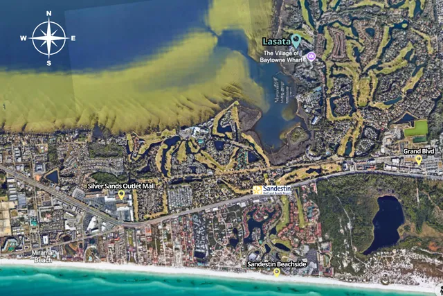 a view of a lake with outdoor seating