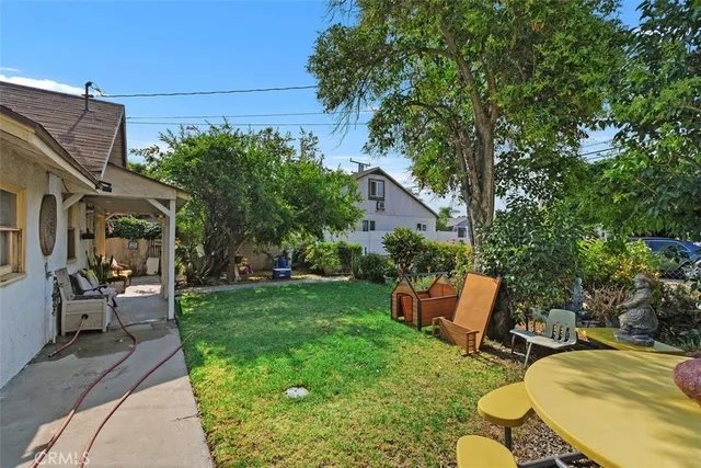 a view of a patio in backyard
