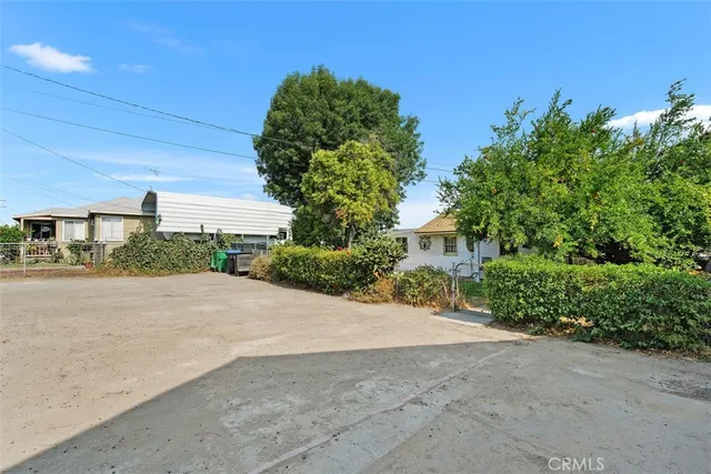 a view of a street with a house