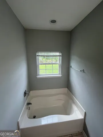 a bathroom with a bathtub
