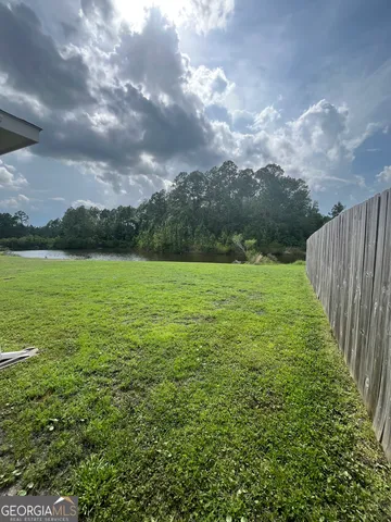 a view of an outdoor space and a yard