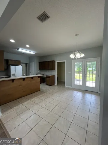 a view of kitchen and window