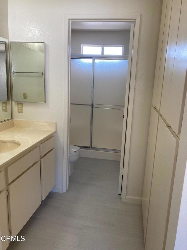 22 North 5th Street, Unit 4 Alhambra, CA 91801 - Photo 4 of 6 a bathroom with a sink and mirror