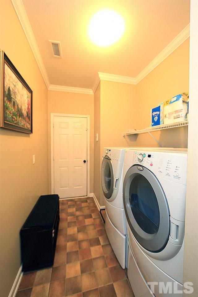 800 Roni Court Cary, NC 27519 - Photo 12 of 25 a view of a storage & utility room with a washer and dryer