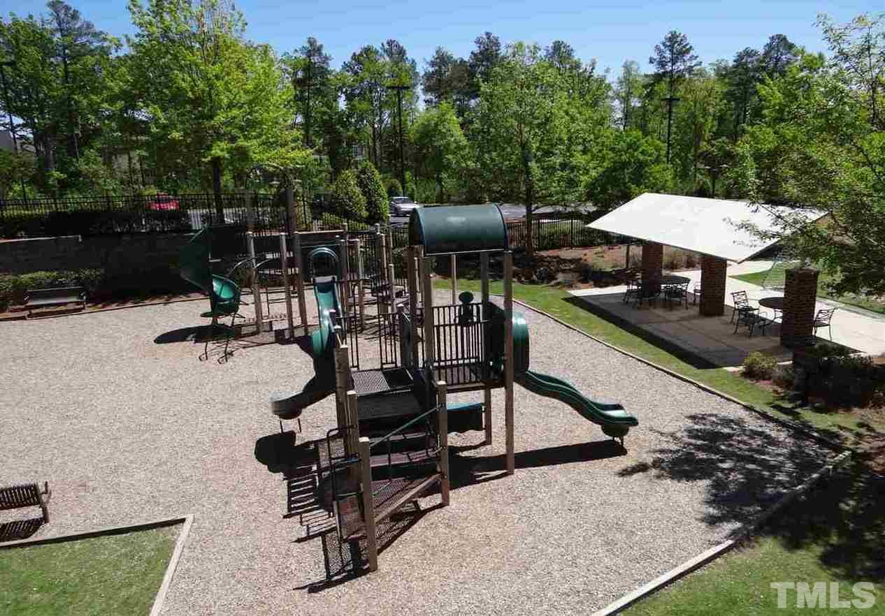 800 Roni Court Cary, NC 27519 - Photo 22 of 25 a view of a backyard with sitting area