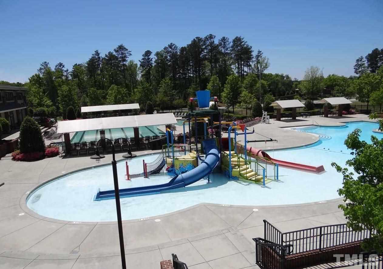 800 Roni Court Cary, NC 27519 - Photo 25 of 25 a view of a swimming pool with lounge chairs