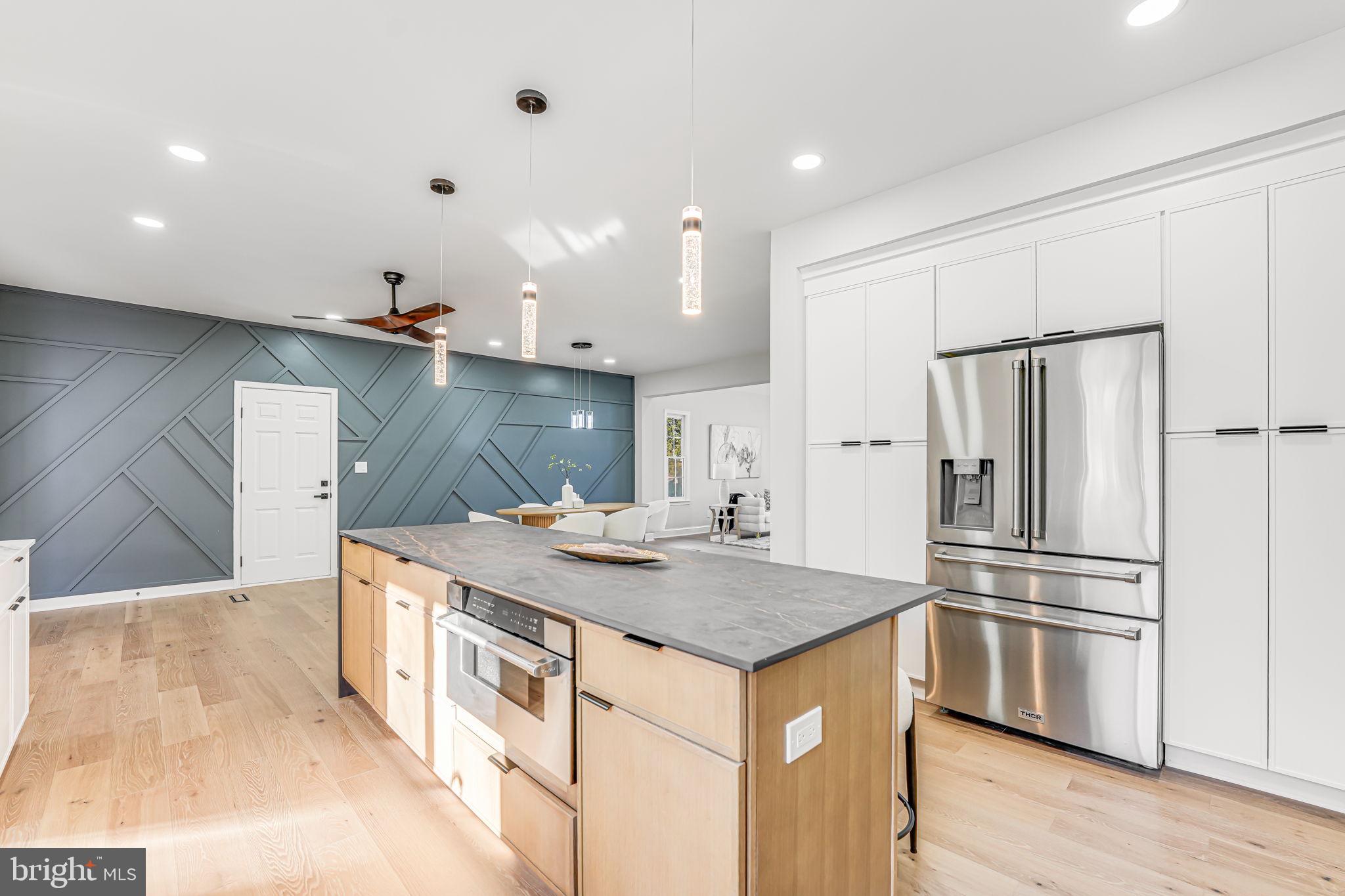 3620 Hill Street Fairfax, VA 22030 - Photo 20 of 71 a kitchen with stainless steel appliances granite countertop a sink a refrigerator and a stove