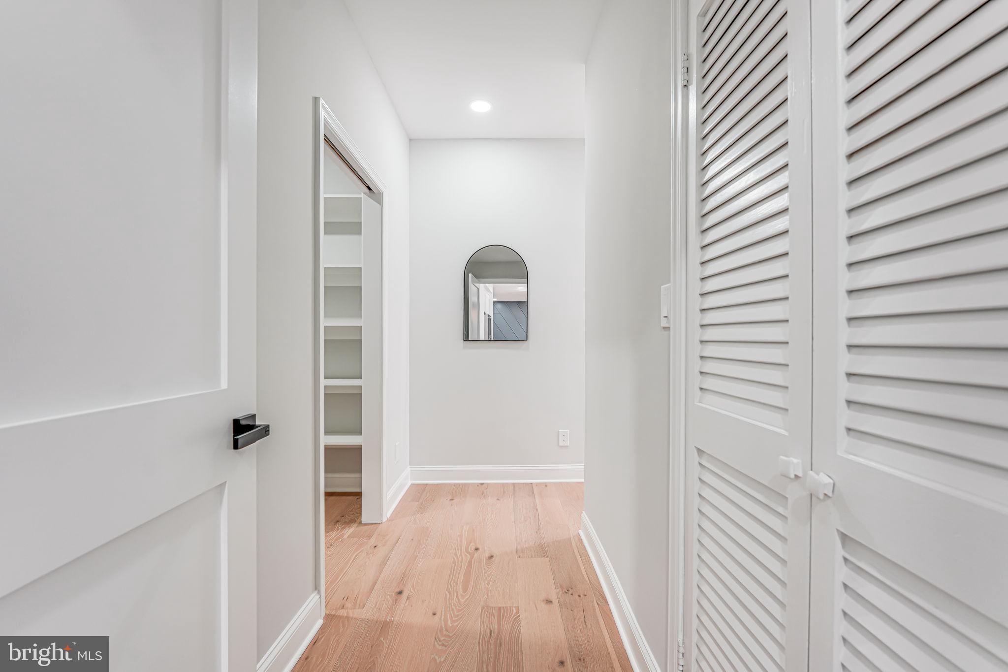 3620 Hill Street Fairfax, VA 22030 - Photo 23 of 71 a view of a hallway with wooden floor and closet