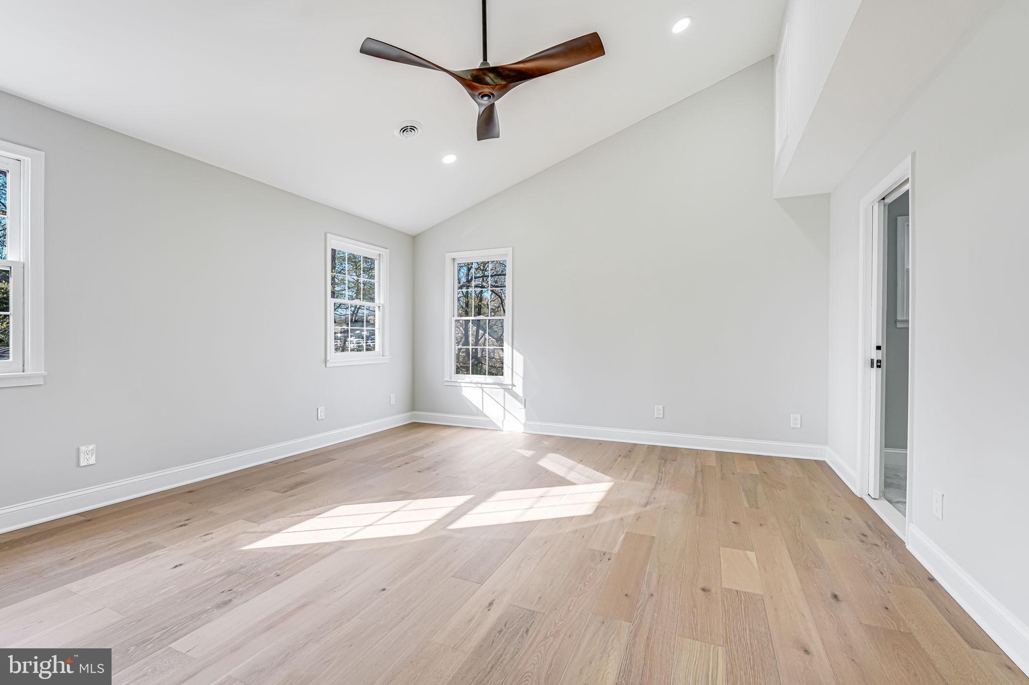 3620 Hill Street Fairfax, VA 22030 - Photo 44 of 71 a view of empty room with wooden floor and fan