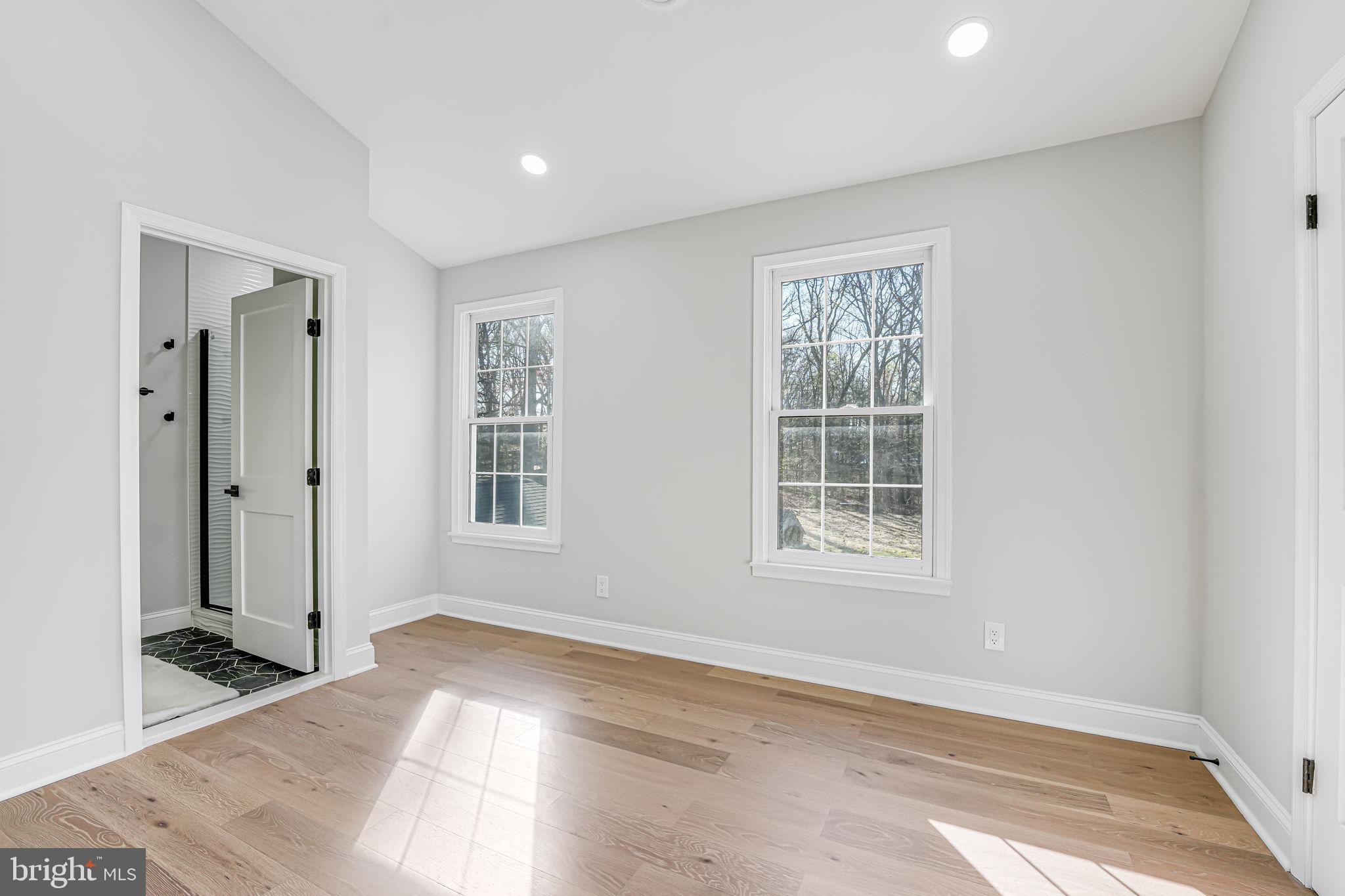 3620 Hill Street Fairfax, VA 22030 - Photo 49 of 71 a view of an empty room with wooden floor and a window