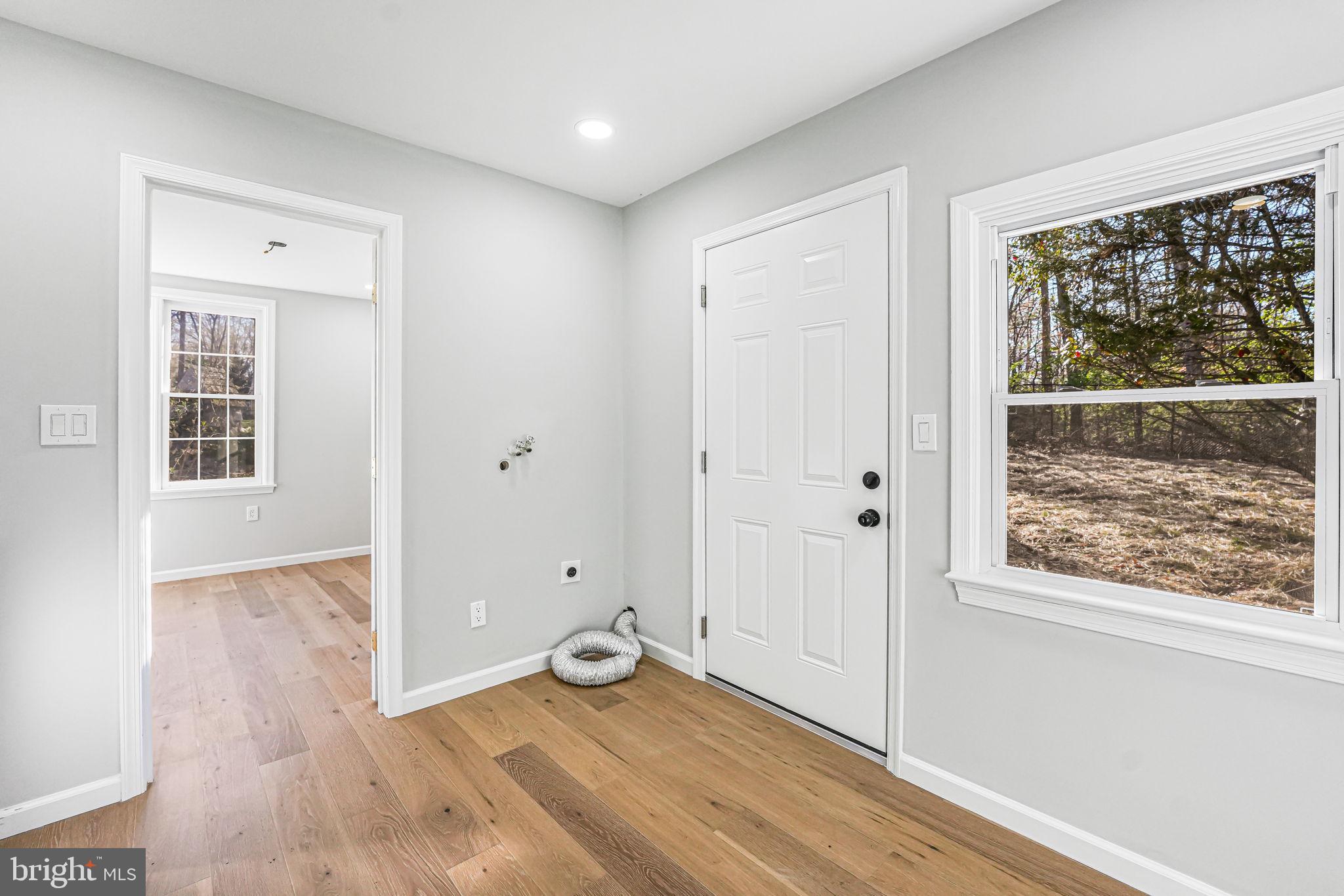 3620 Hill Street Fairfax, VA 22030 - Photo 70 of 71 an empty room with wooden floor and windows