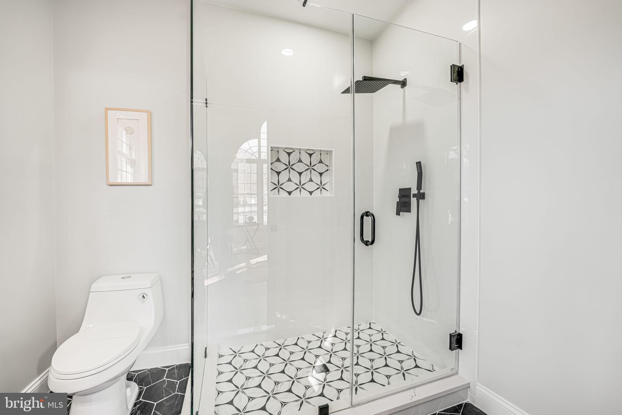 3620 Hill Street Fairfax, VA 22030 - Photo 10 of 71 a bathroom with a toilet and shower