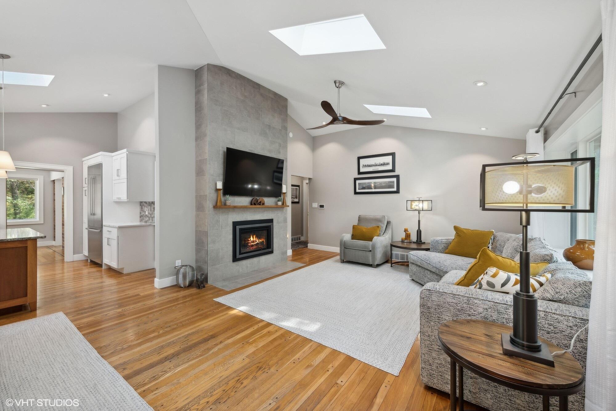 4 Circle Drive Dune Acres, IN 46304 - Photo 8 of 31 a living room with furniture and a flat screen tv