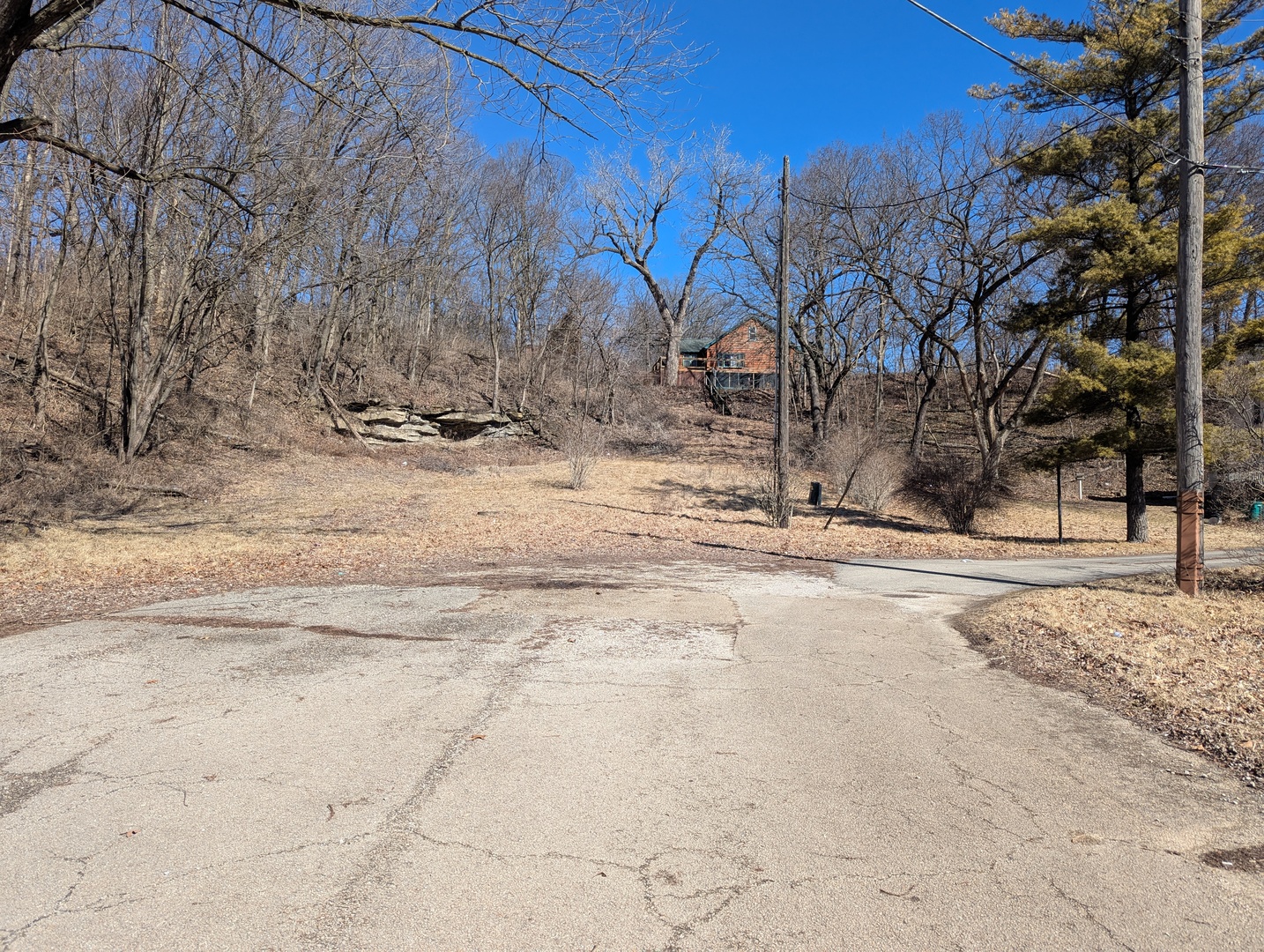 a view of snow on the side of the road