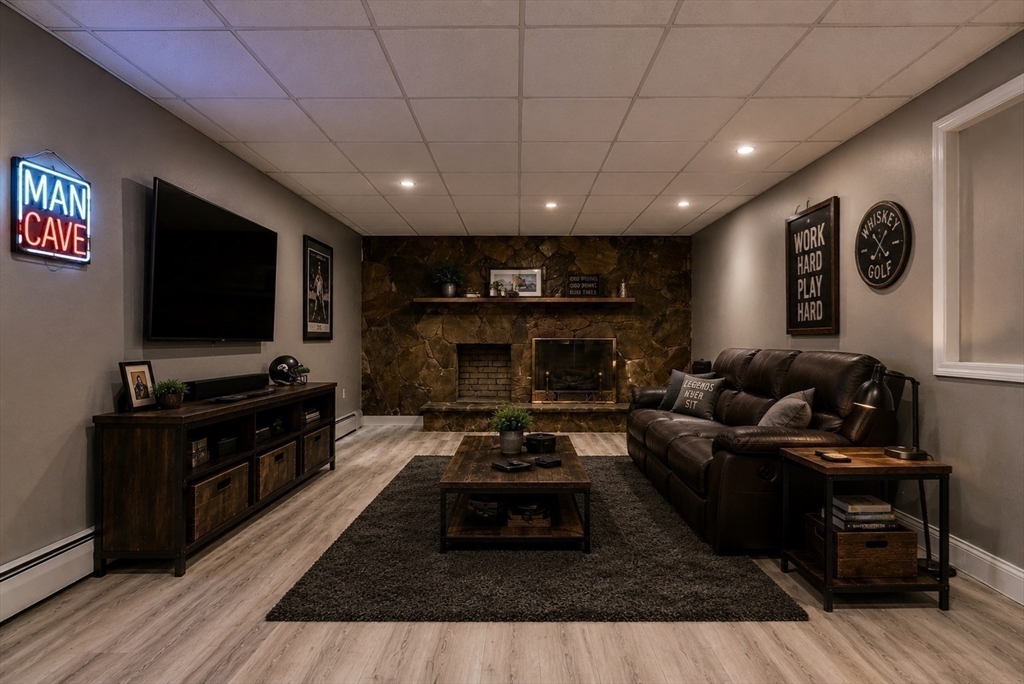 41 Watuppa Road Westport, MA 02790 - Photo 38 of 42 a living room with furniture and a flat screen tv