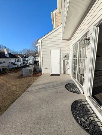 a backyard of a house with a yard and garage
