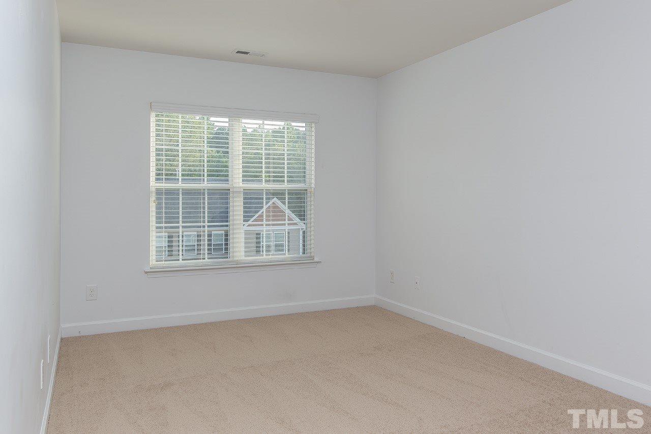 707 Turmeric Lane Durham, NC 27713 - Photo 11 of 18 an empty room with a window