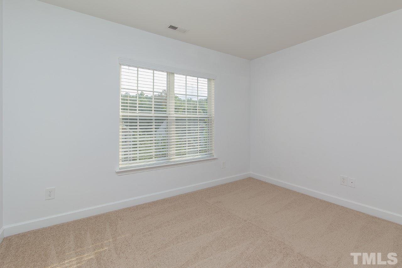 707 Turmeric Lane Durham, NC 27713 - Photo 14 of 18 an empty room with a window