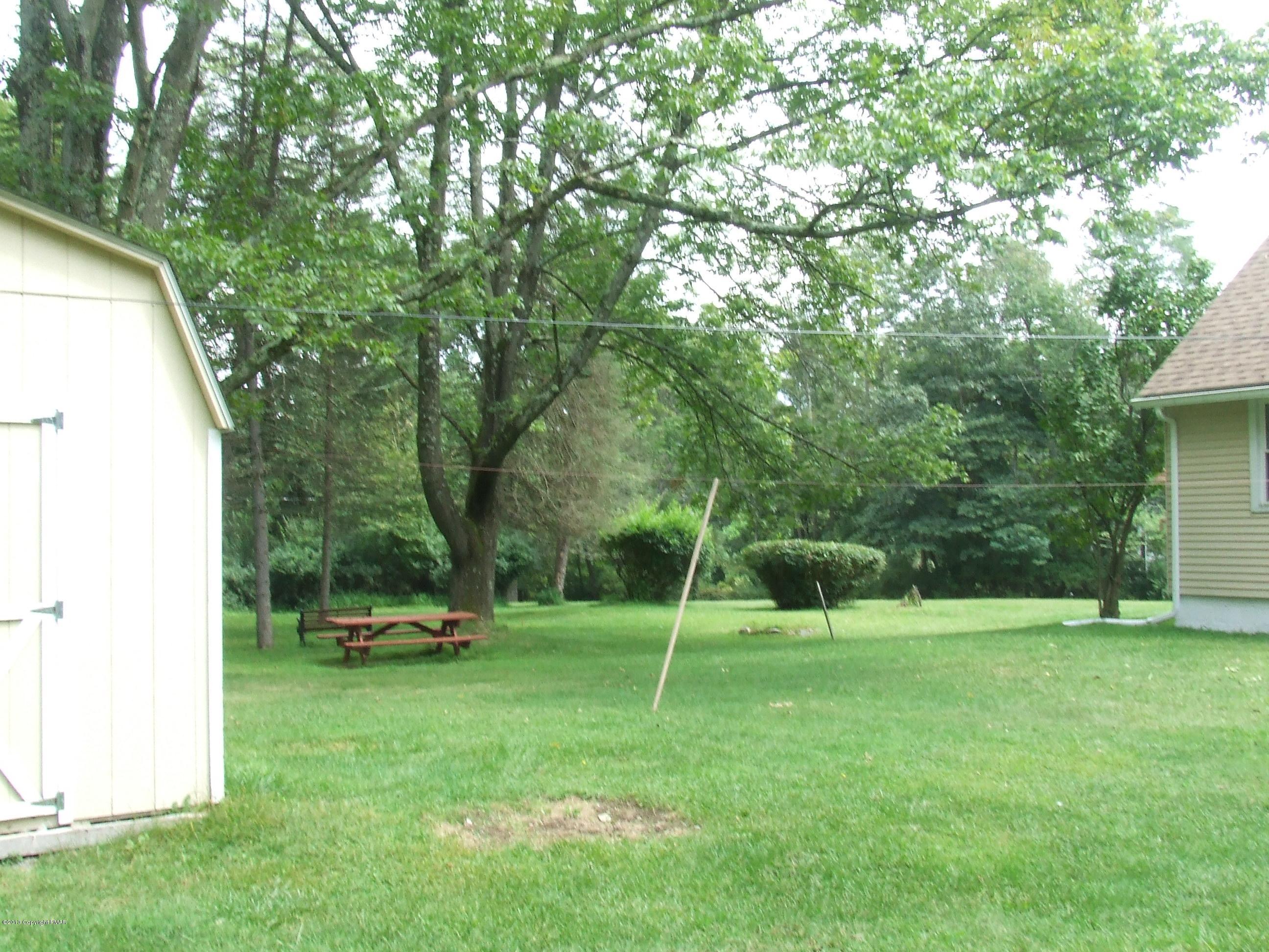 6023 Running Valley Road Stroudsburg, PA 18360 - Photo 18 of 39 a view of a park with a slide