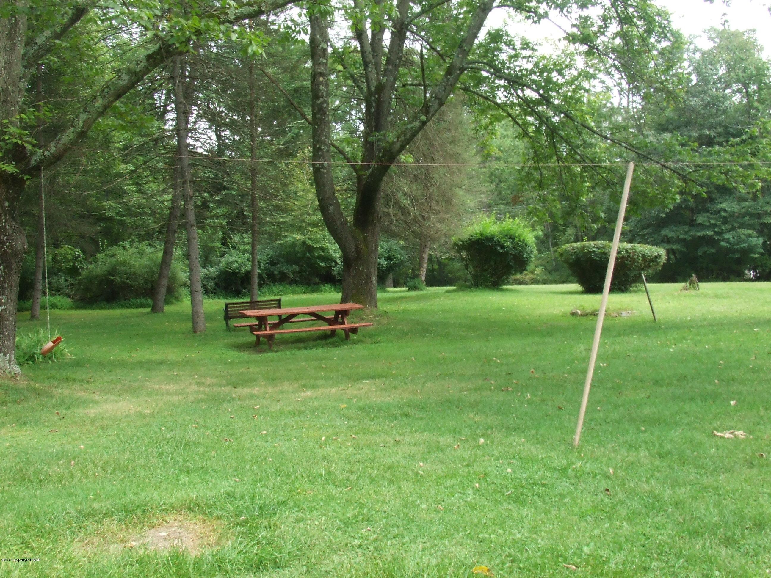 6023 Running Valley Road Stroudsburg, PA 18360 - Photo 21 of 39 a view of a park with a slide