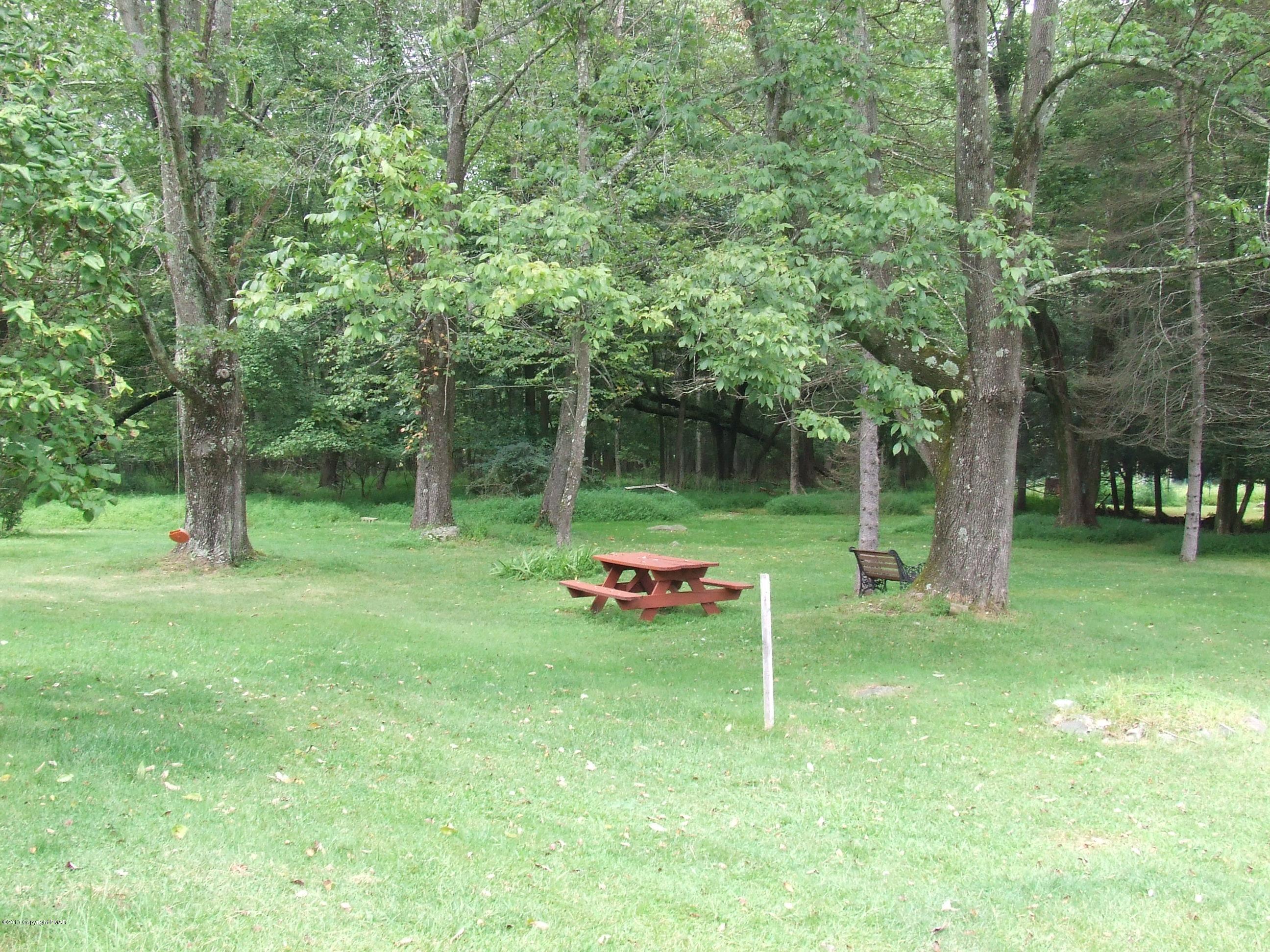 6023 Running Valley Road Stroudsburg, PA 18360 - Photo 5 of 39 a view of backyard with a barn and large trees