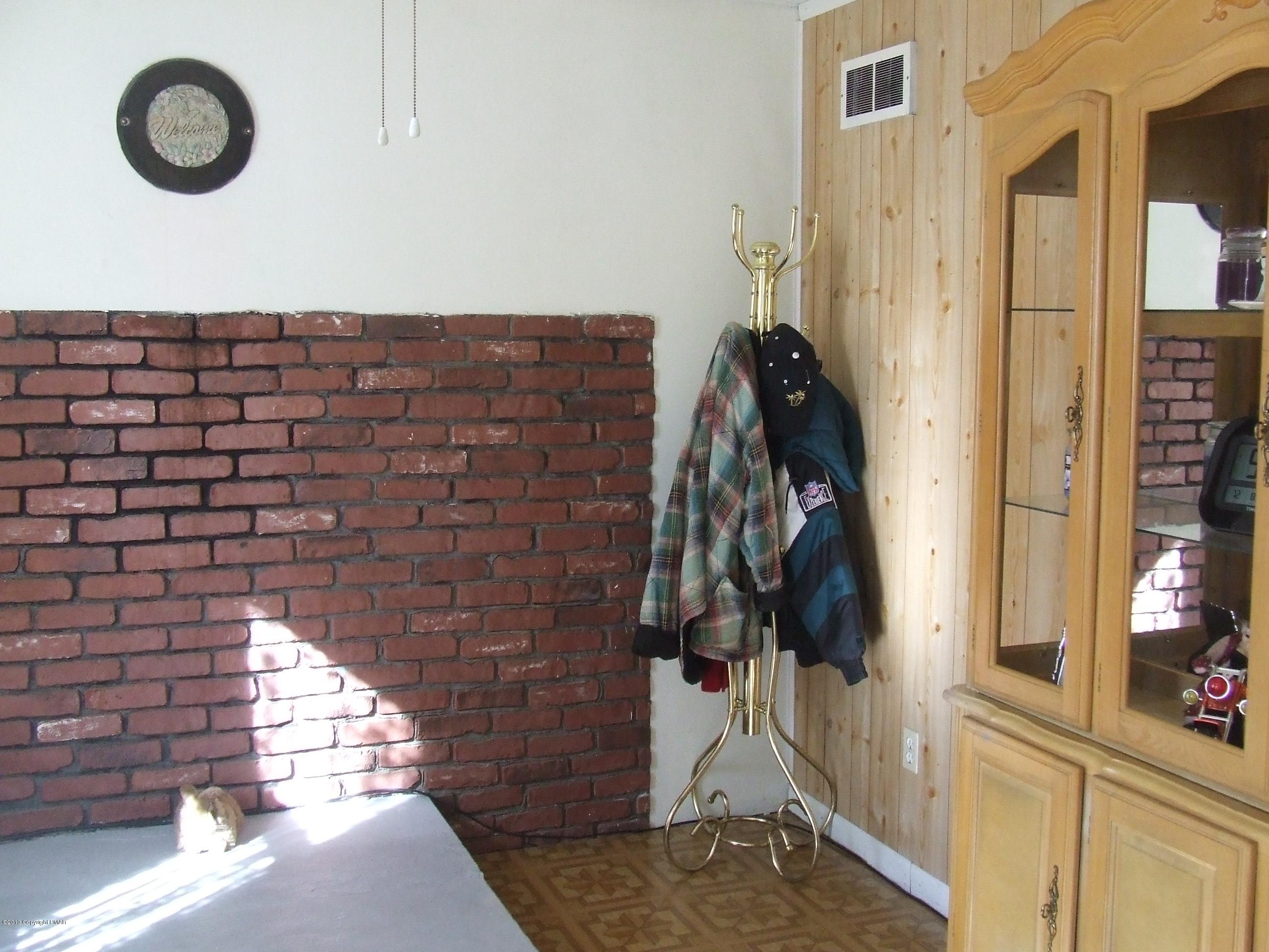 6023 Running Valley Road Stroudsburg, PA 18360 - Photo 6 of 39 a view of entryway with wooden floor