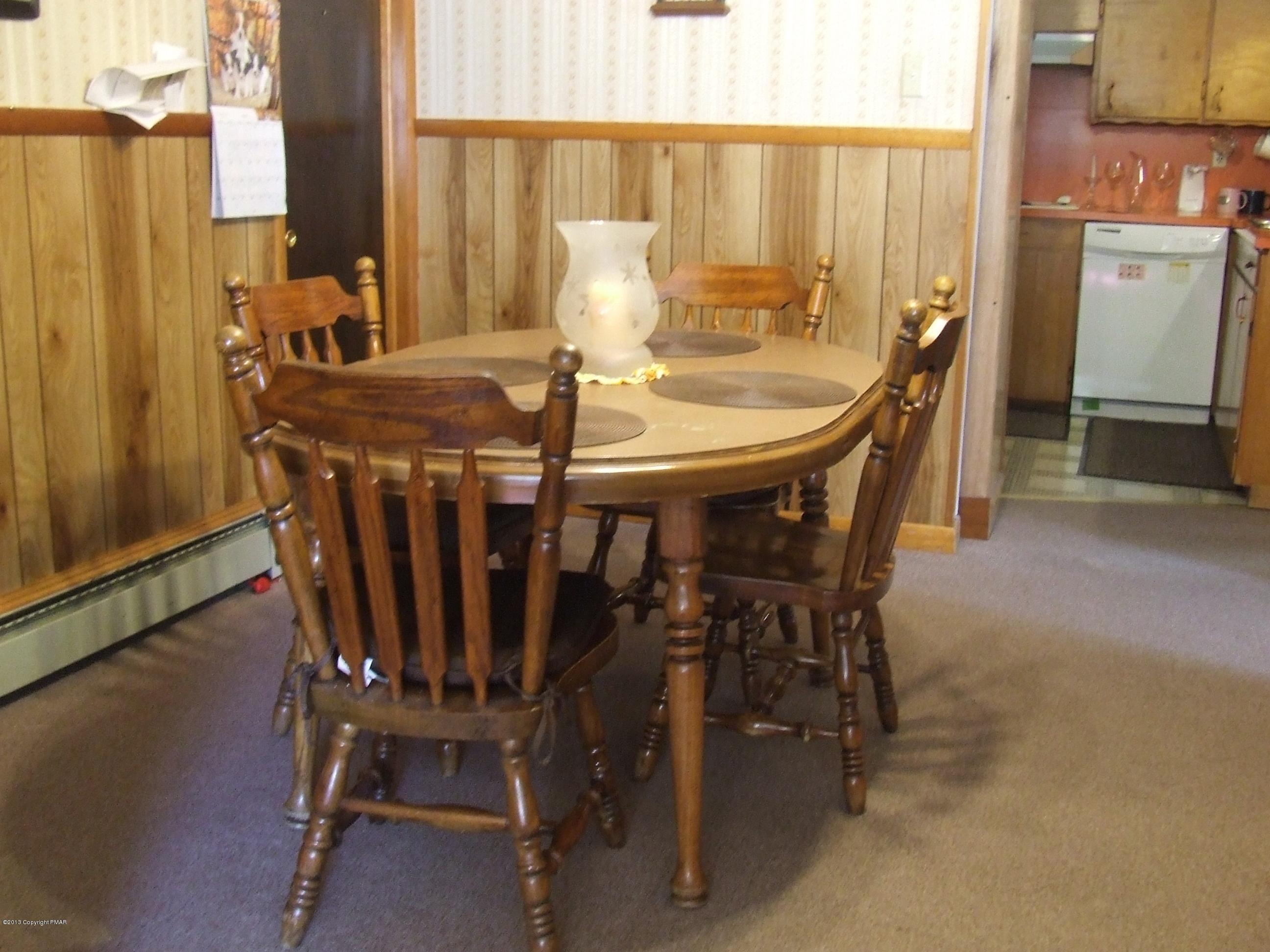 6023 Running Valley Road Stroudsburg, PA 18360 - Photo 7 of 39 a view of a dining room with furniture and window