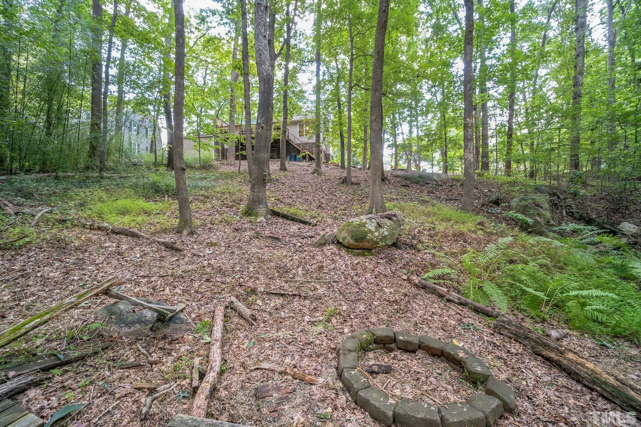 620 Long Avenue Roxboro, NC 27573 - Photo 29 of 39 a backyard of a house with lots of green space