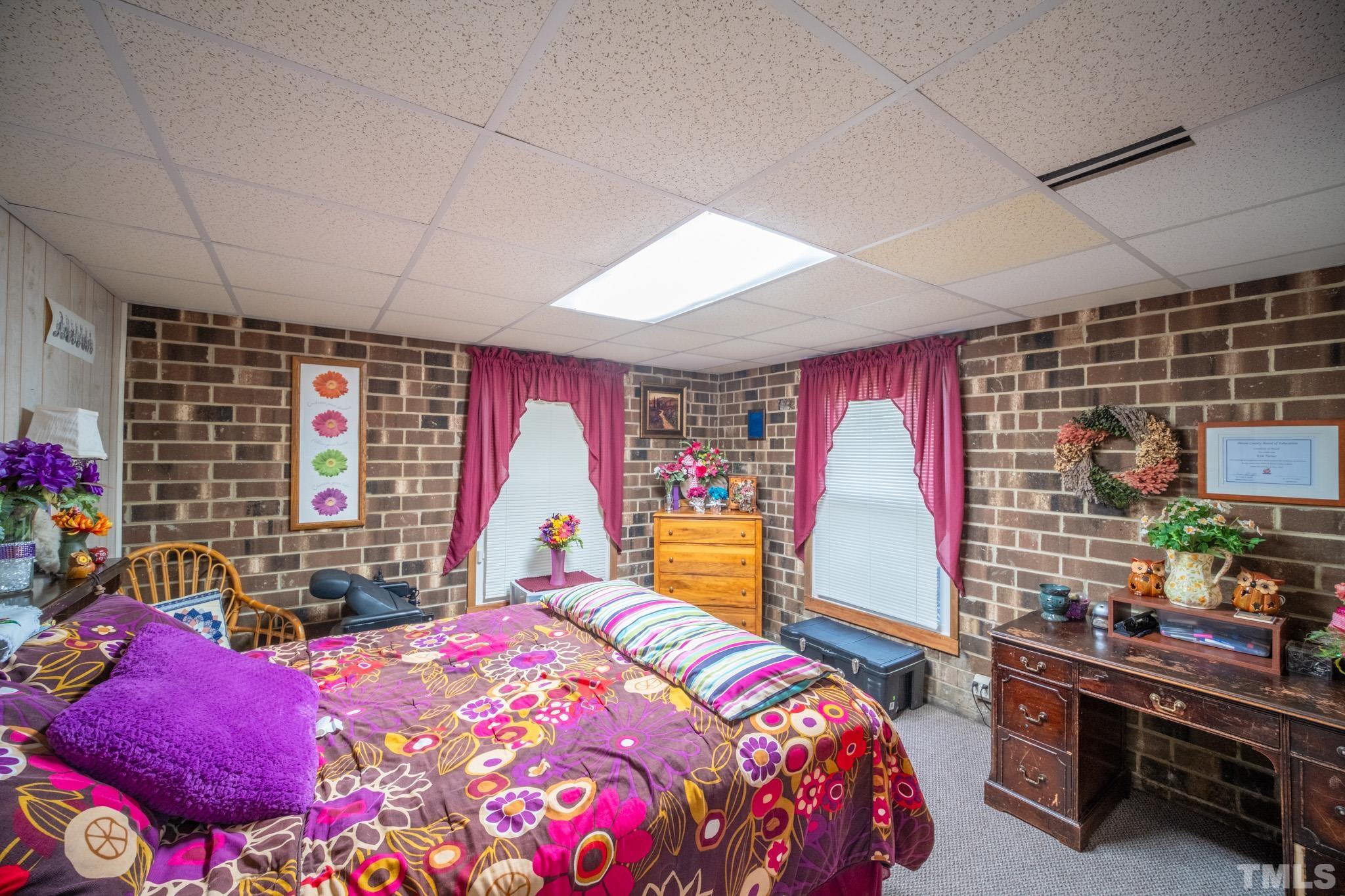 620 Long Avenue Roxboro, NC 27573 - Photo 33 of 39 a bedroom with a bed and a window