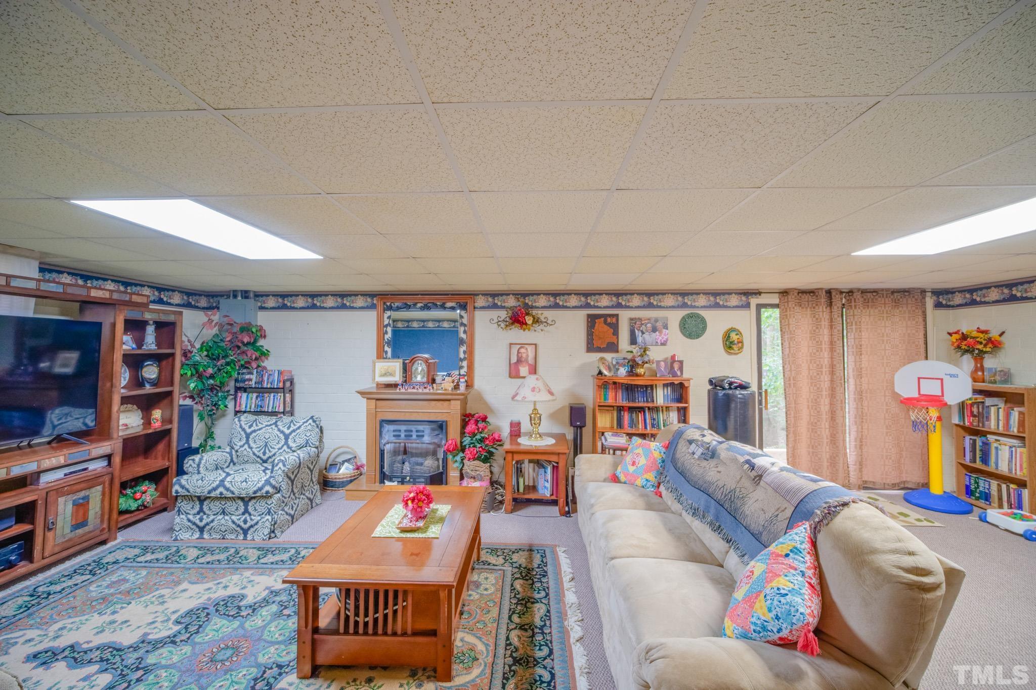 620 Long Avenue Roxboro, NC 27573 - Photo 35 of 39 a living room with furniture and a flat screen tv