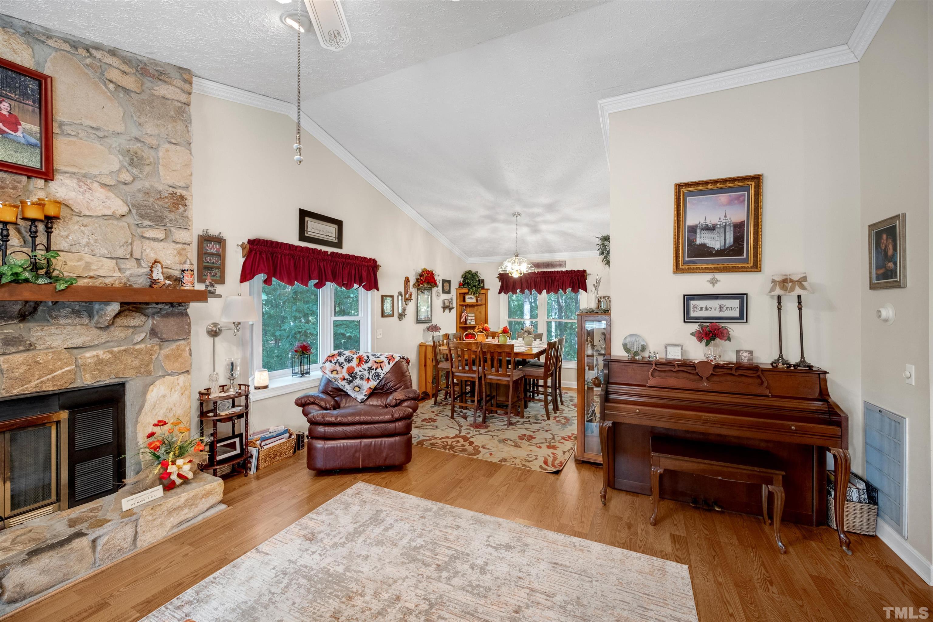 620 Long Avenue Roxboro, NC 27573 - Photo 5 of 39 a living room with furniture and a fireplace