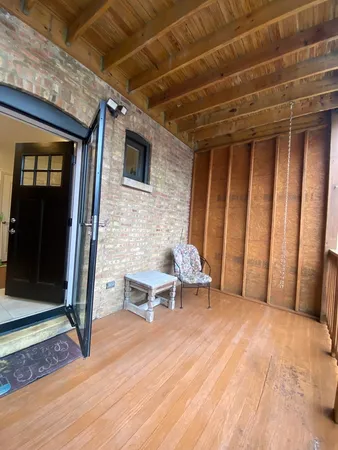 a view of an outdoor space and wooden floor