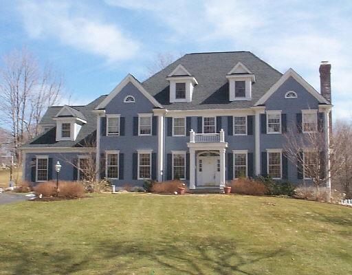 136 Barry Avenue Ridgefield, CT 06877 - Photo 1 of 1 a front view of a building with a yard