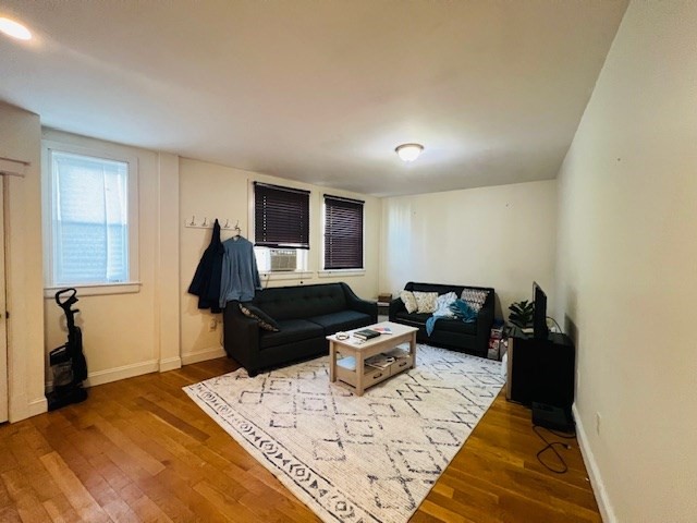 51 Calumet Street, Unit 1 Boston, MA 02120 - Photo 1 of 7 a living room with furniture and a couch