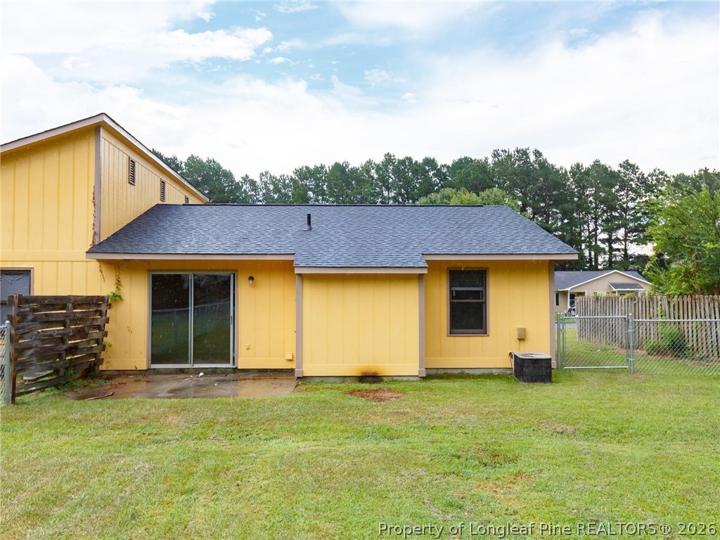 115 Eulon Loop, Unit A Raeford, NC 28376 - Photo 13 of 16 a view of a house with backyard