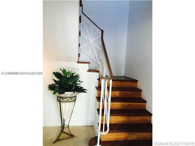 3921 Meridian Avenue Miami Beach, FL 33140 - Photo 20 of 29 a view of entryway with wooden floor