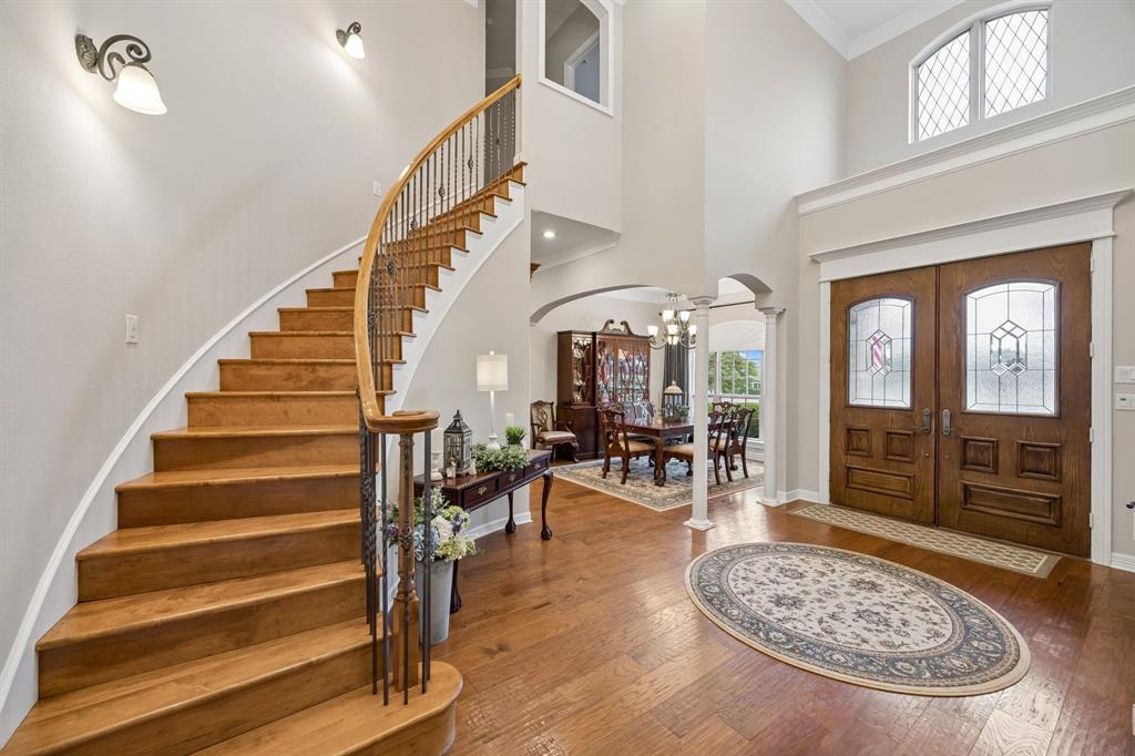 2930 Falcon Way Midlothian, TX 76065 - Photo 3 of 40 a view of entryway and hall with wooden floor