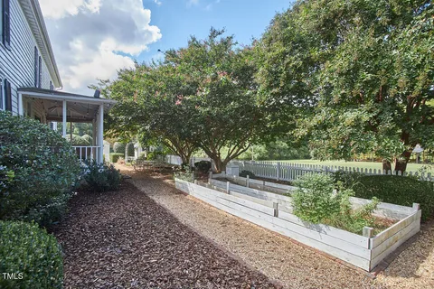 a living room with furniture a couch and a fireplace