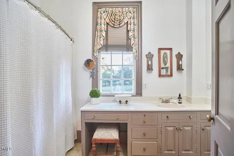 a view of a patio with table and chairs