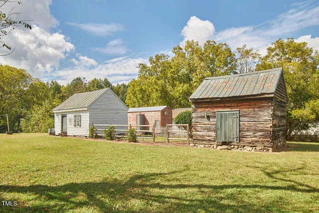 a view of swimming pool and trees in the background