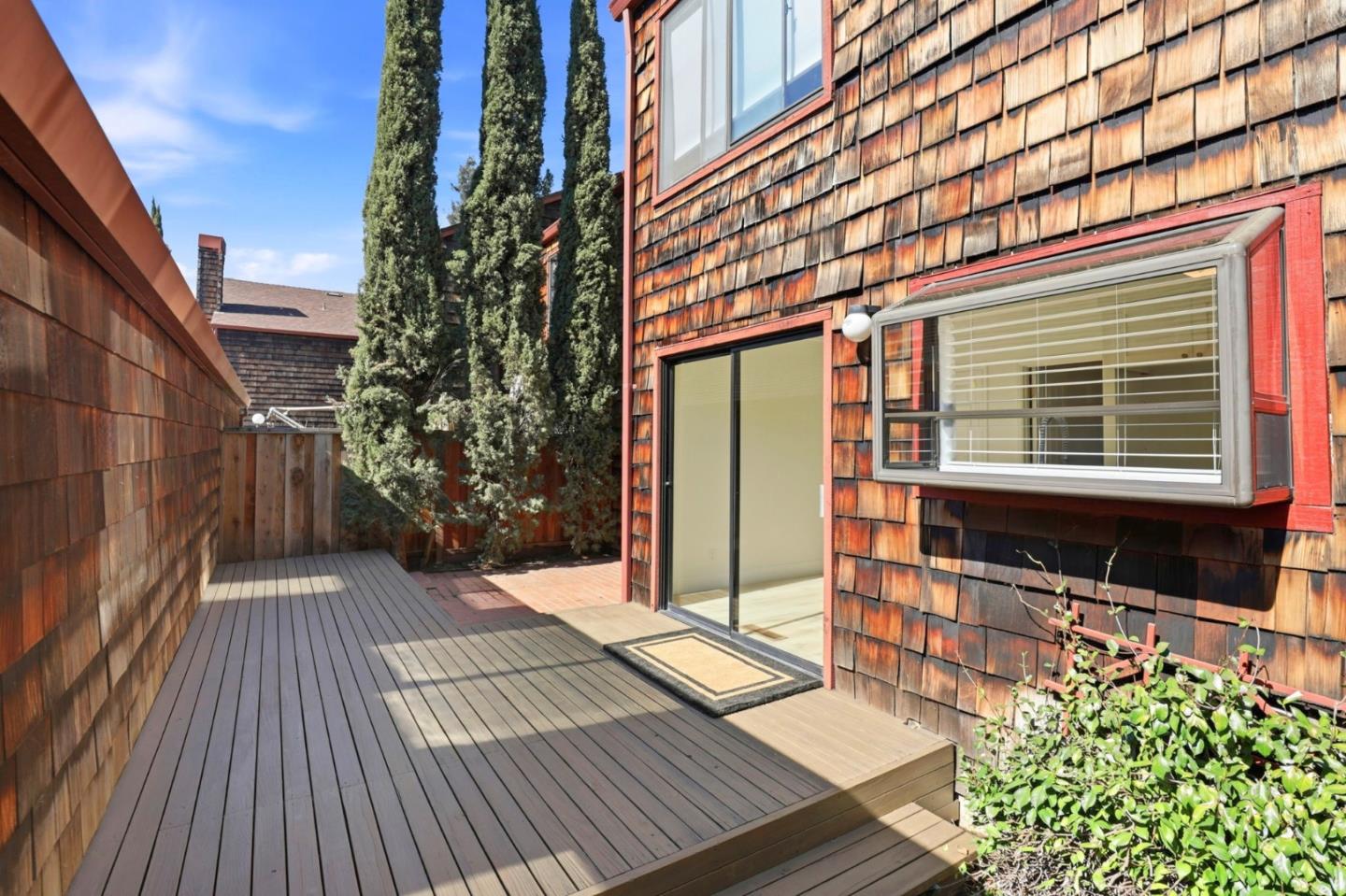 1555 Hecker Pass Road, Unit H102 Gilroy, CA 95020 - Photo 24 of 34 a view of a backyard with sitting area