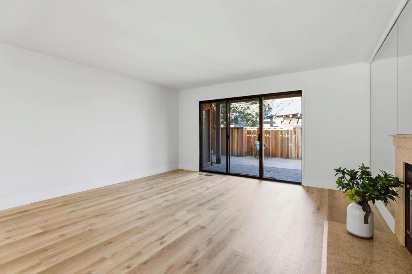 1555 Hecker Pass Road, Unit H102 Gilroy, CA 95020 - Photo 5 of 34 a view of an empty room with a window