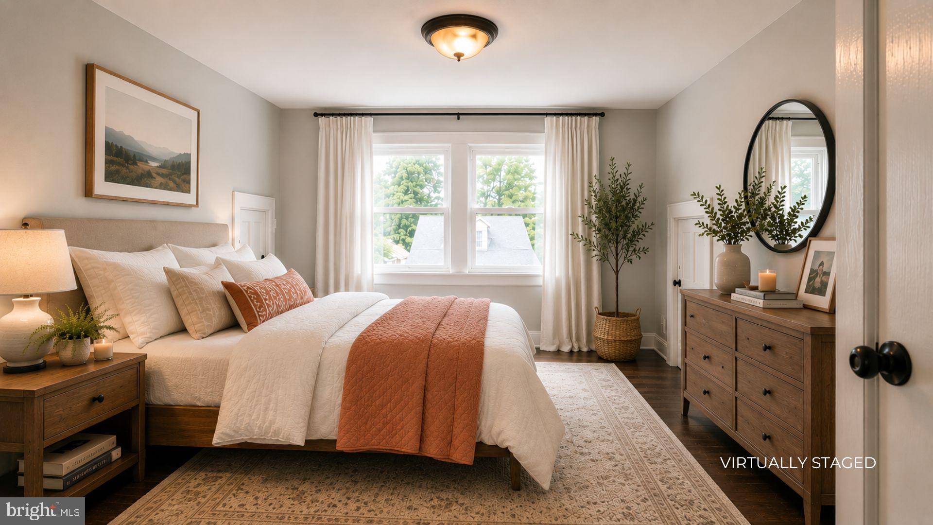 154 Andrew Street Hamilton, NJ 08610 - Photo 21 of 29 a bedroom with a bed and a potted plant