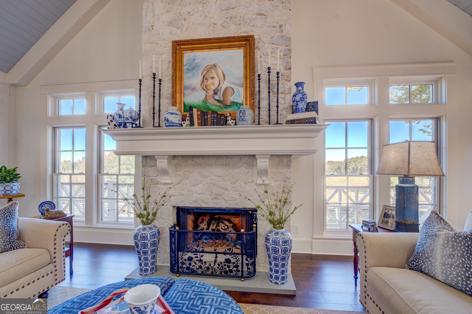 419 Parker Road McDonough, GA 30252 - Photo 17 of 115 a living room with furniture a fireplace and windows