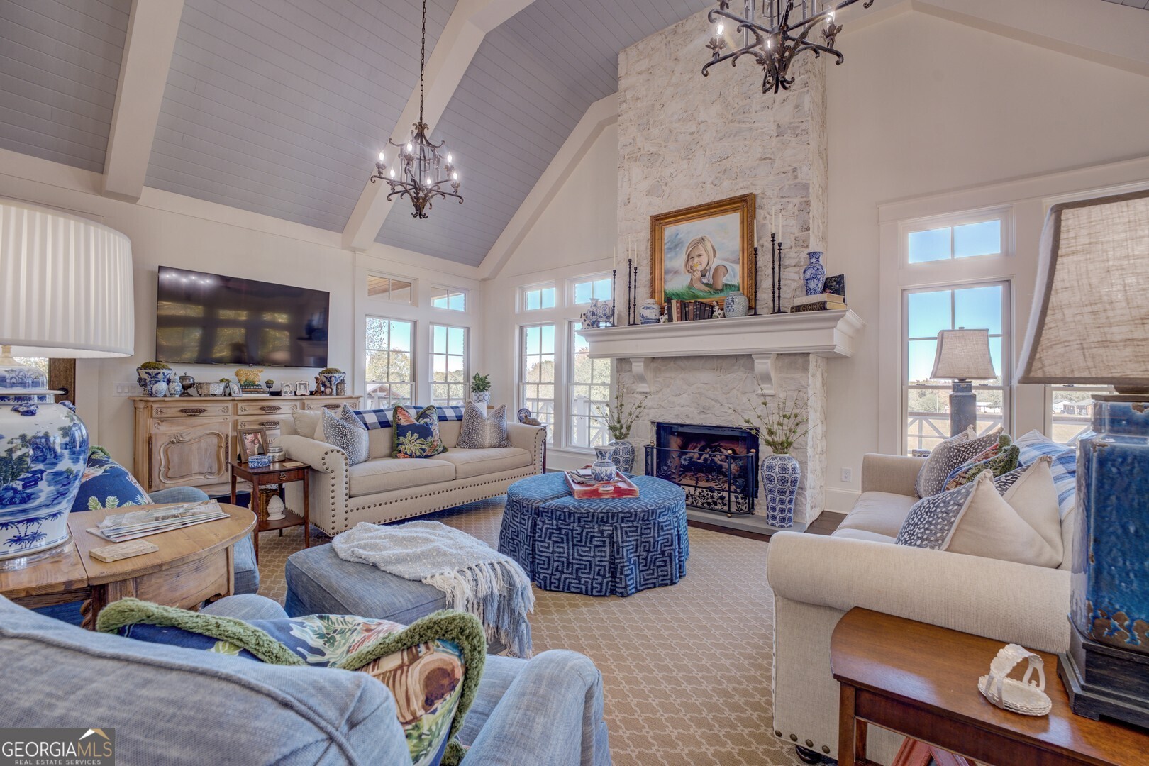 419 Parker Road McDonough, GA 30252 - Photo 19 of 115 a living room with furniture a fireplace and a flat screen tv