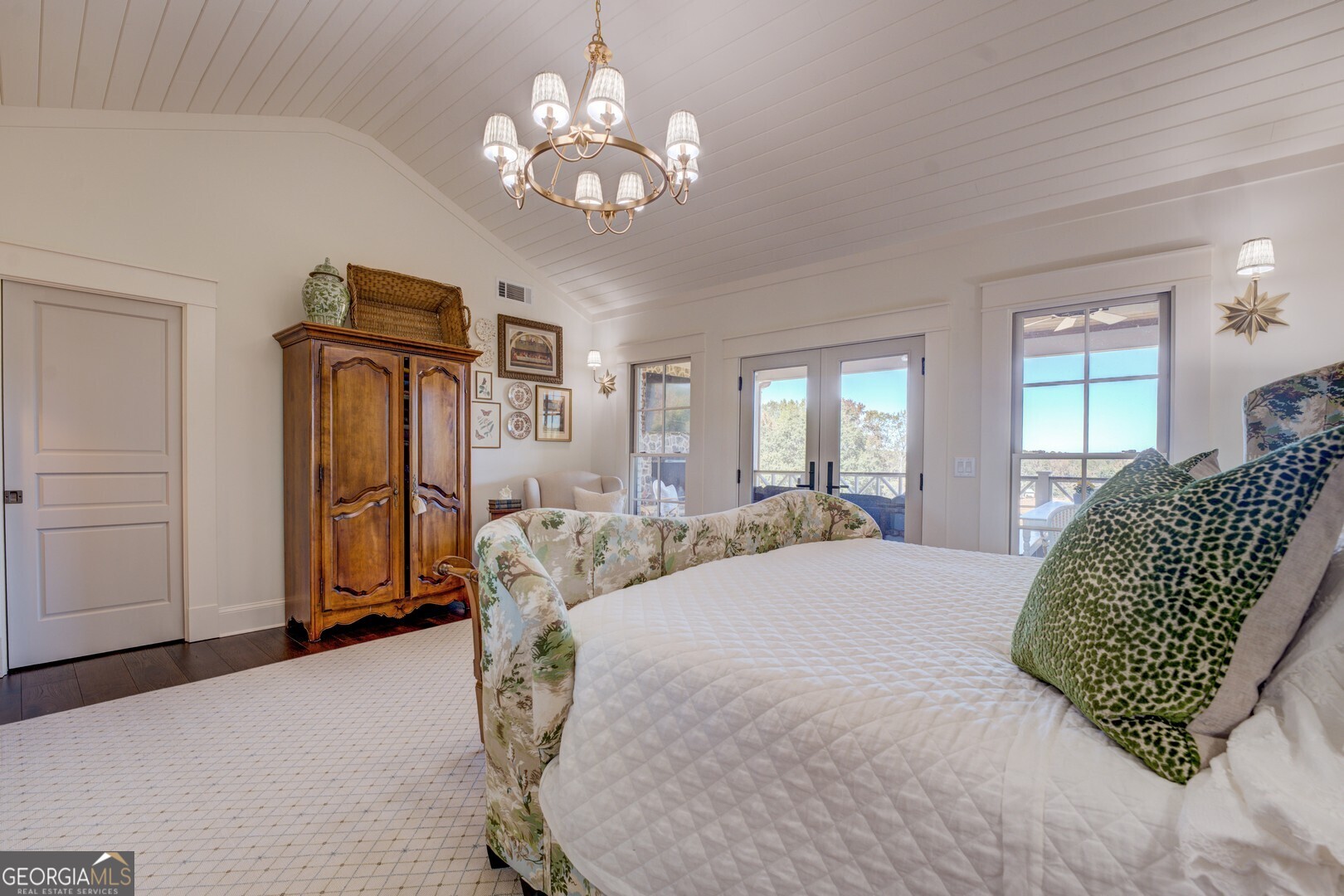 419 Parker Road McDonough, GA 30252 - Photo 54 of 115 a spacious bedroom with a bed mirror and dresser