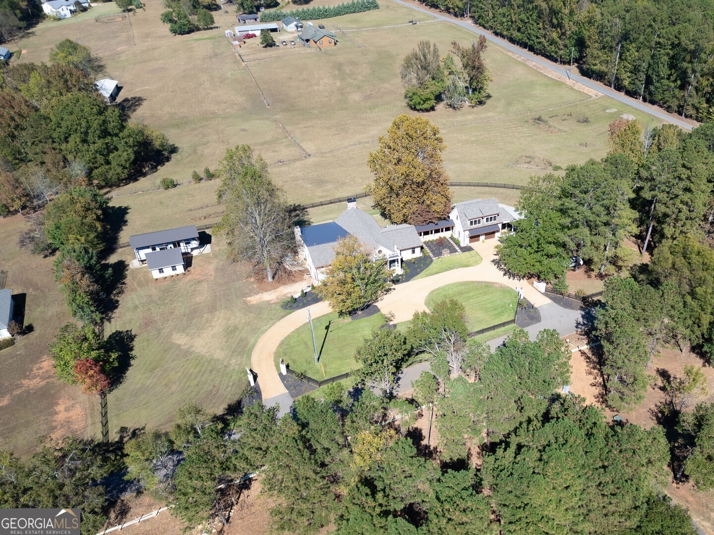 419 Parker Road McDonough, GA 30252 - Photo 94 of 115 an aerial view of a house with a yard and greenery