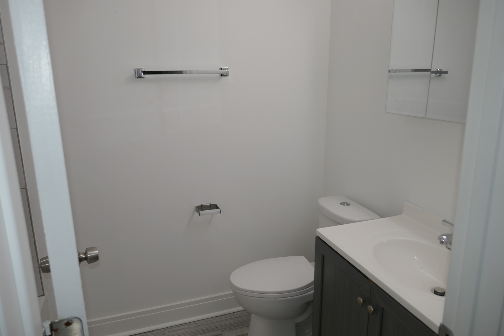 412 Salem Square Bolingbrook, IL 60440 - Photo 12 of 20 a bathroom with a sink and toilet